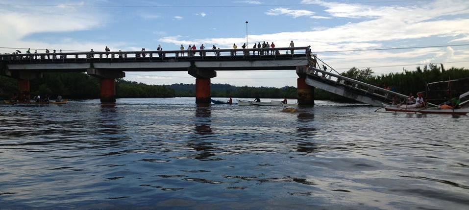 The damaged Abatan Bridge which has become a symbol of the urgency for many people to bring relief goods to isolated places.