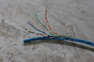 Figure 1.  An original cable with 4 twisted pairs.  The wires are firm and a thin string is included in the wire and can be used to break open the cover as it is very hard to tear without tools.