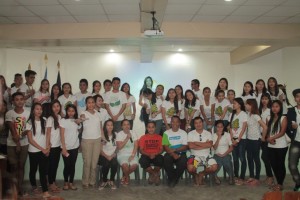Making a stand. As others sat, several HNU SEED and tourism students made a stand for the environment and walked in slippers or barefoot to pool slippers for deprived children and to reconnect the body from the earth in attempts to start a healthy lifestyle. (rac/PIABohol)