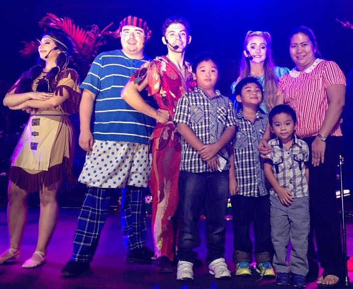 The cast of Peter Pan the Musical Adventure poses for photos with the audience after the show.