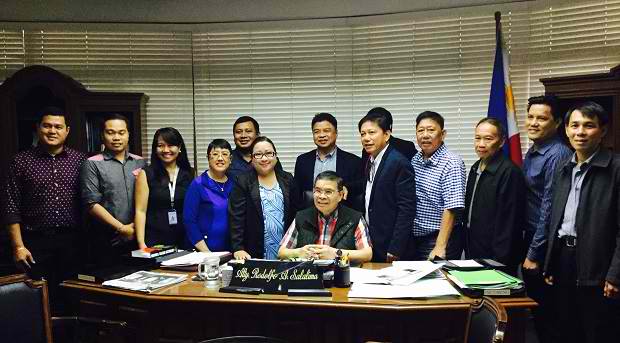 Officials of the NICP with DICT secretary Rudy Salalima (seated)